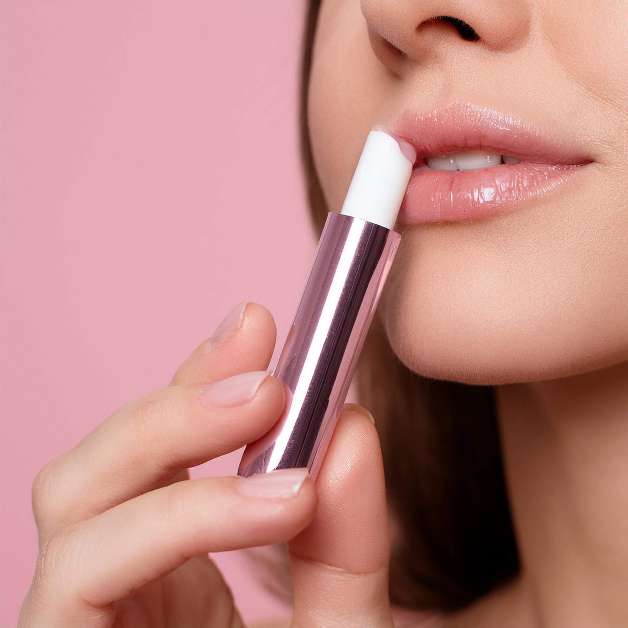 View of female lips and lip gloss