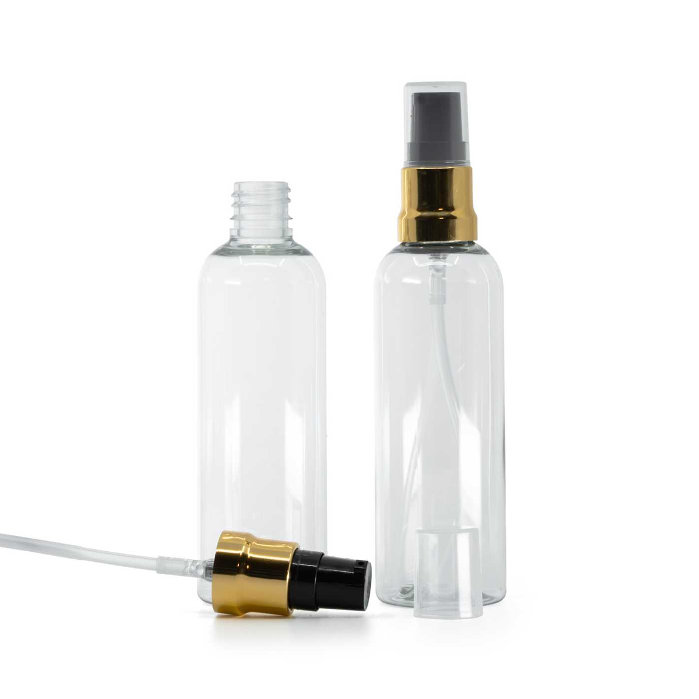 Flacon en plastique transparent avec pompe noire et or brillante et capot transparent, 100 ml