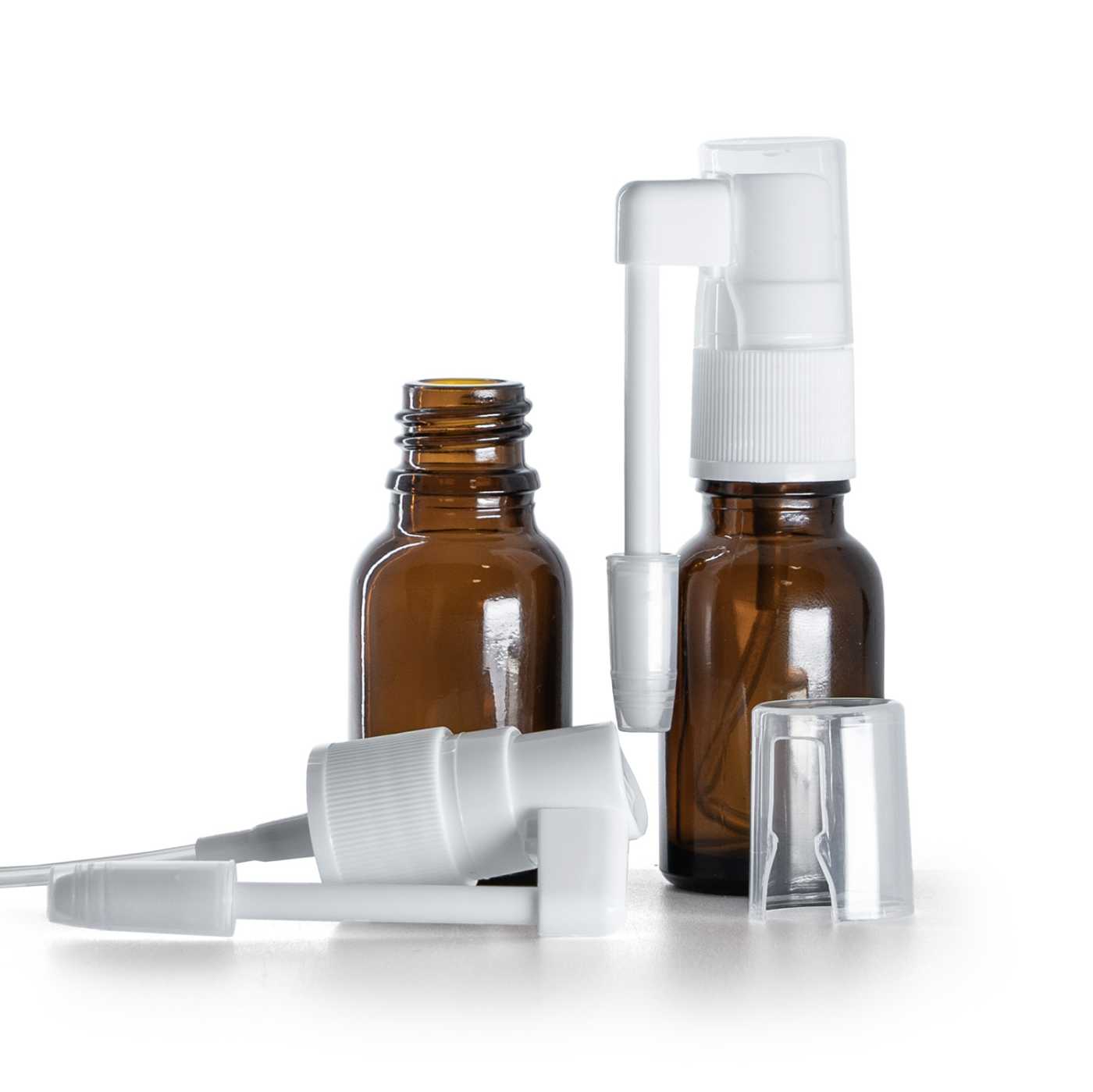 Hnědá skleněná lahvička s bílým ústním sprejem, 15 ml