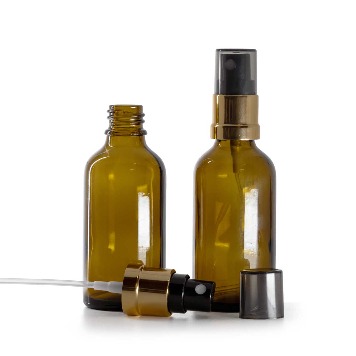 Sklenená liekovka, čierno-zlatý rozprašovač, dymový kryt, 50 ml