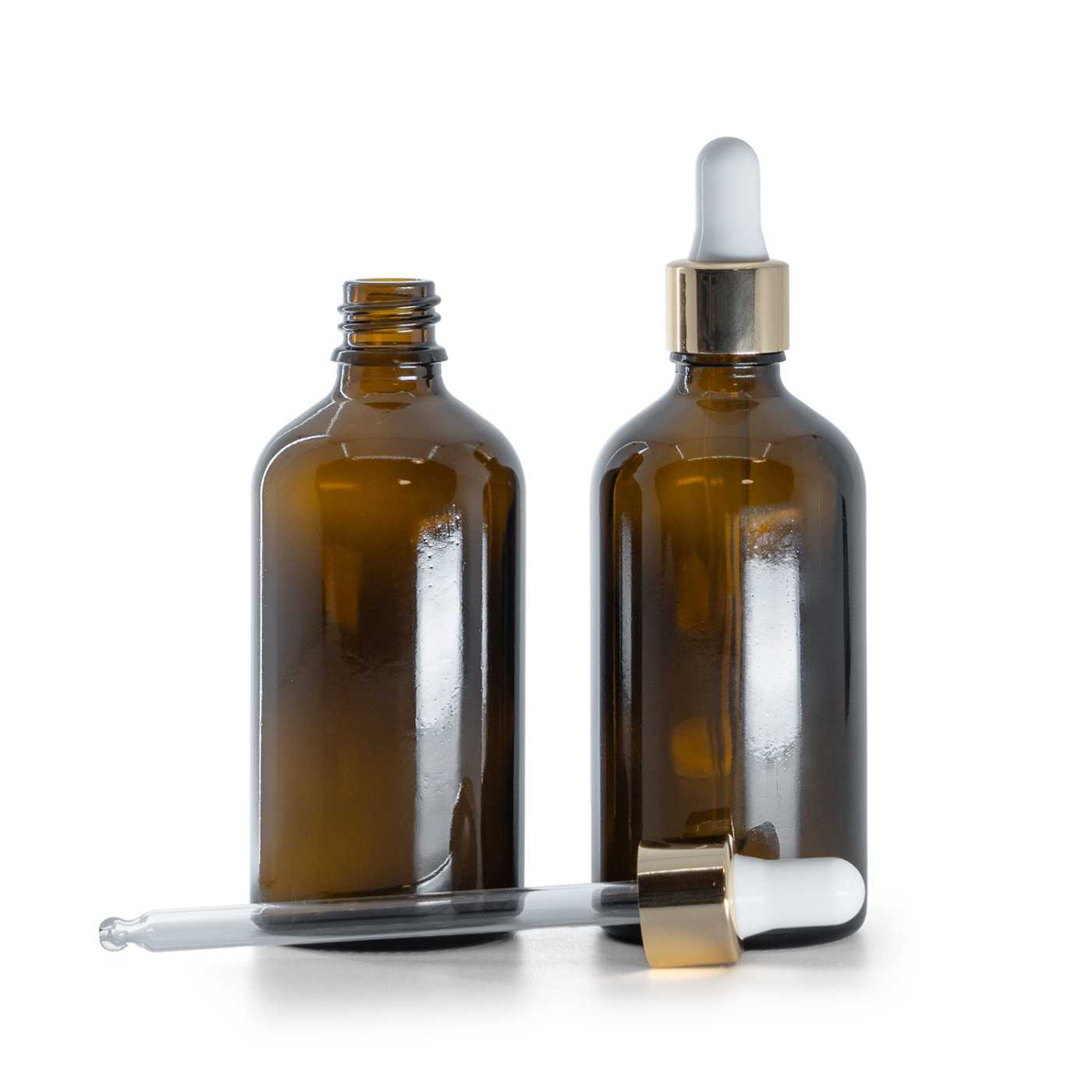 Hnědá skleněná lahvička s bílo-zlatou pipetou, 100 ml