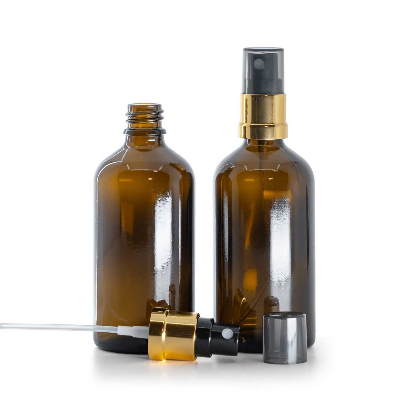 Sklenená liekovka, čierno-zlatý rozprašovač, dymový kryt, 100 ml