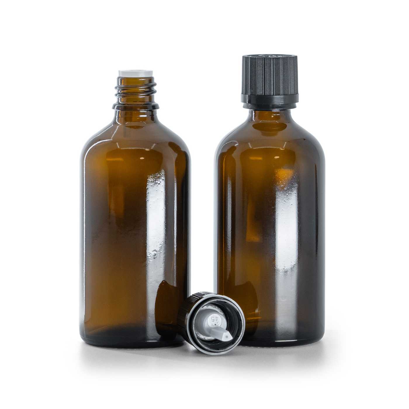 Sklenená fľaška, liekovka, čierny vrúbkovaný vrchnák s poistkou, 100 ml