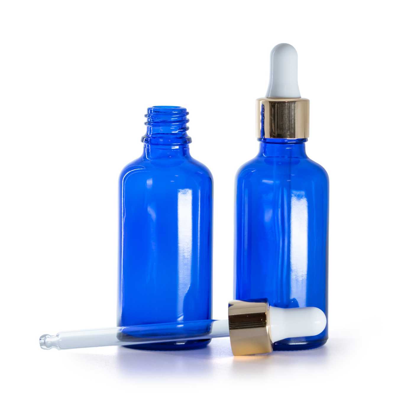 Blaue Glasflasche mit weiß-goldenem Pipettenverschluss, 50 ml