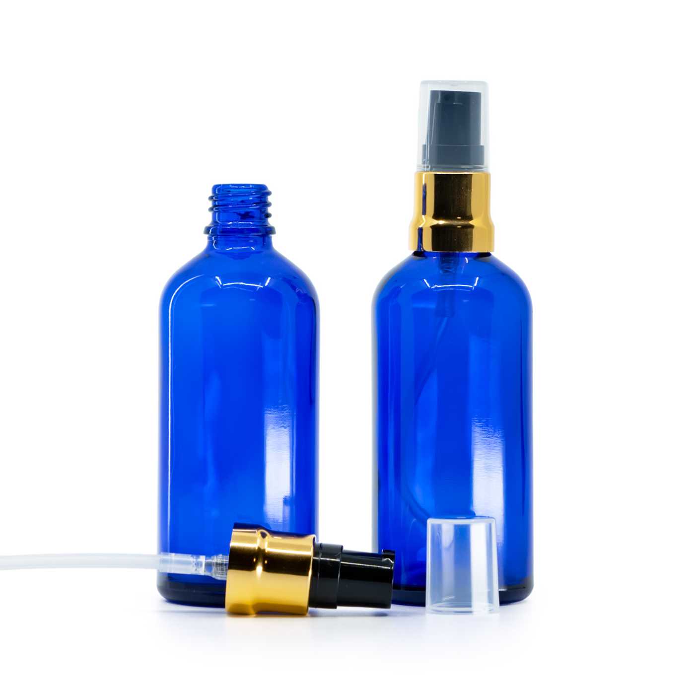 Butelka szklana, niebieska, czarno-złoty błyszczący dozownik, przezroczysty wierzch, 100 ml