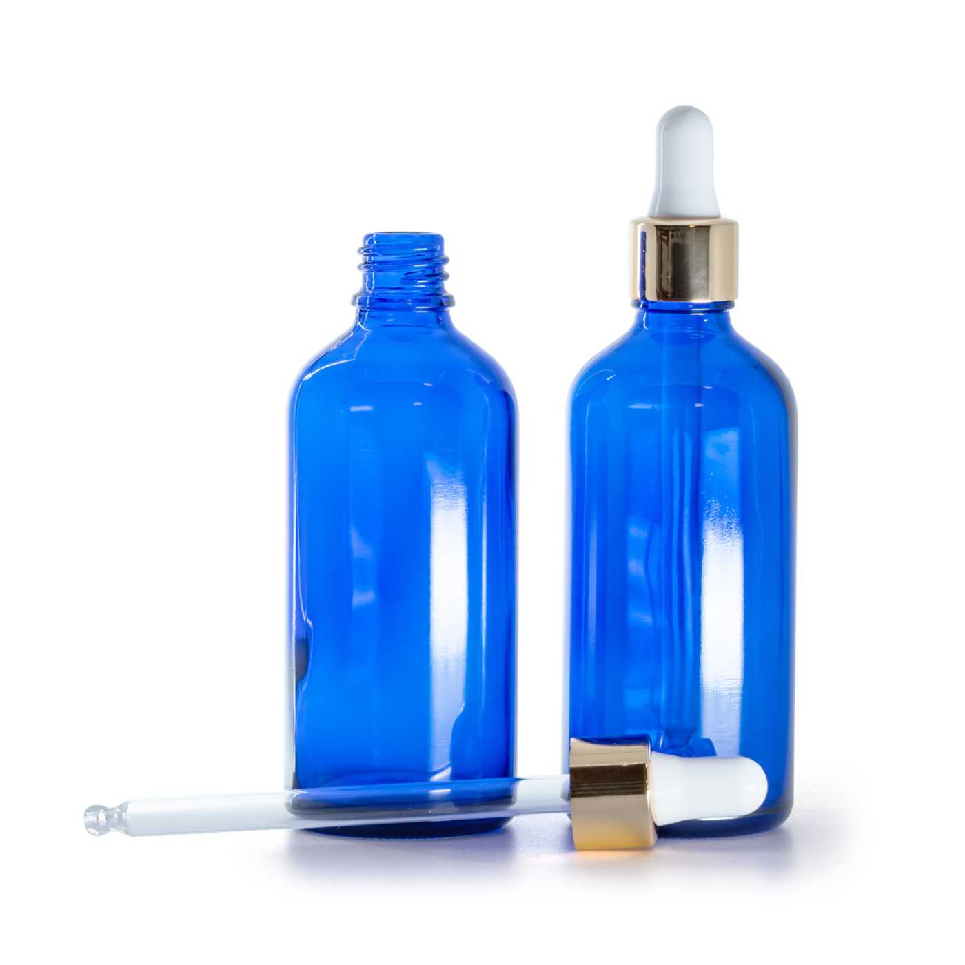 Blaue Glasflasche, gold-weißer Tropfenzähler, 100 ml