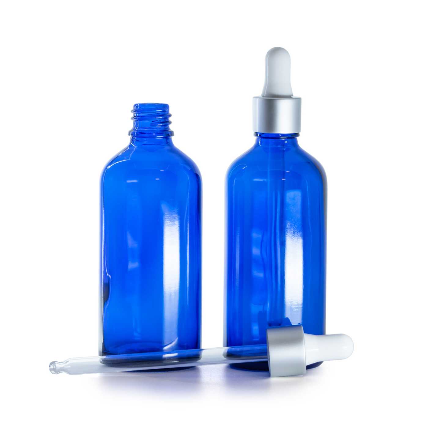 Blaue Glasflasche mit mattsilbernem Pipettenverschluss 100 ml