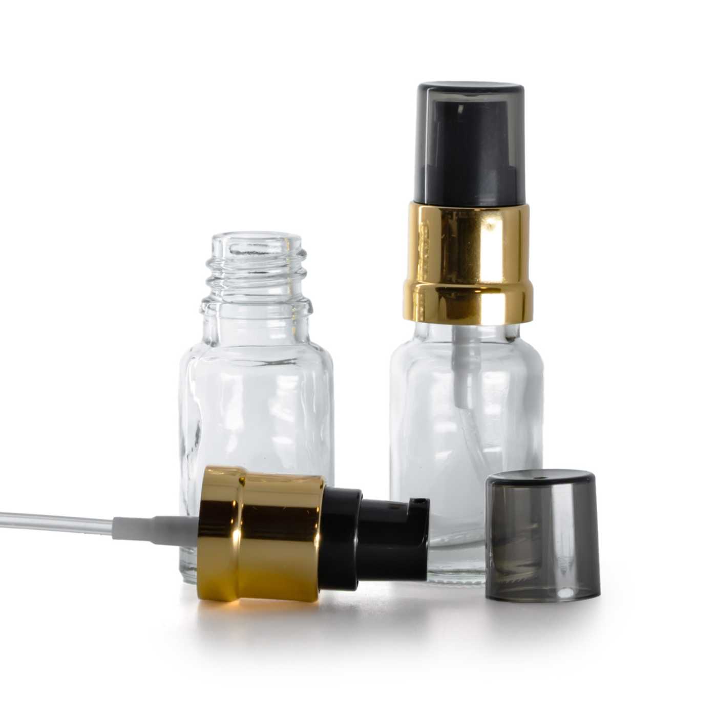 Flacon en verre transparent, pompe noire dorée brillante avec surcapuchon fumé, 10 ml