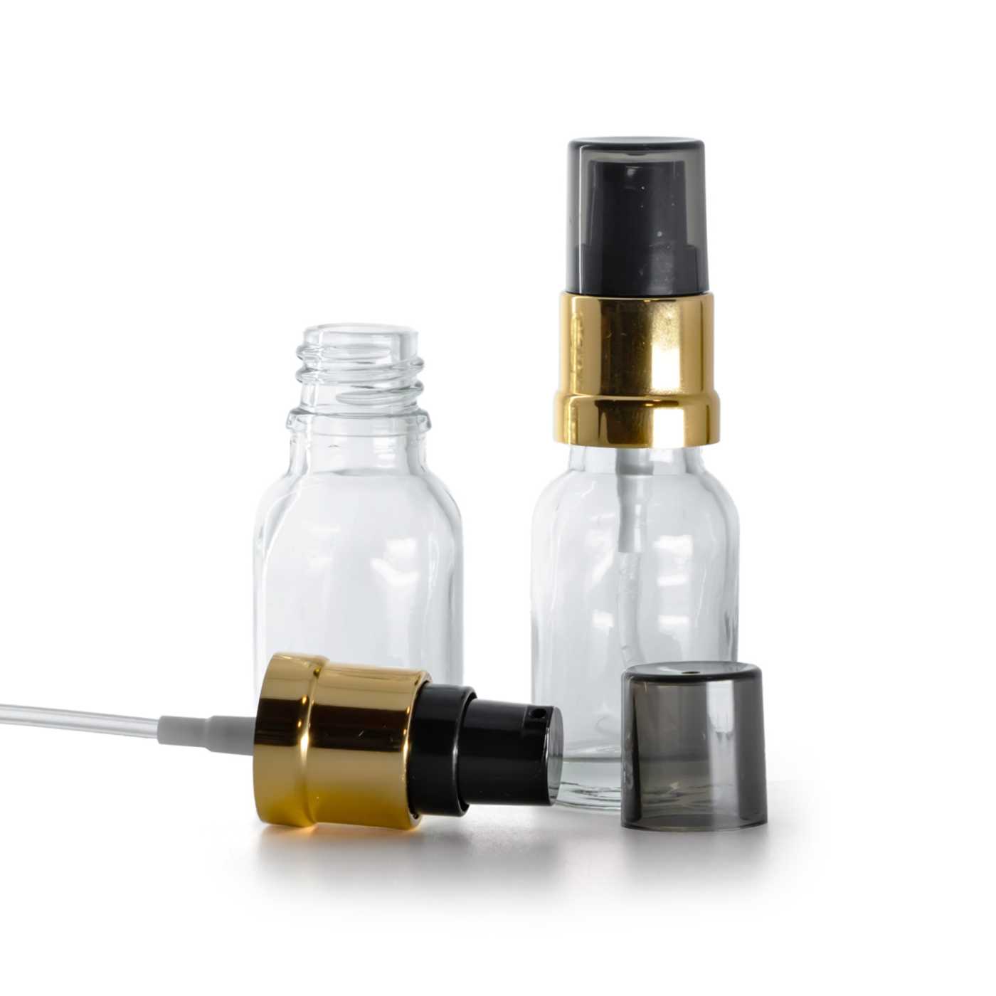 Sklenená fľaška, priehľadná, čierno-zlatý lesklý dávkovač s dymovým krytom, 15 ml