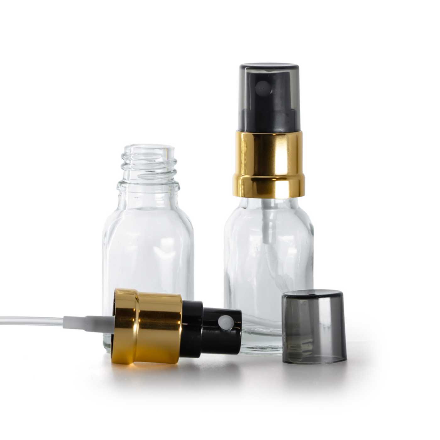 Sklenená fľaška, priehľadná, čierno-zlatý rozprašovač, dymový kryt, 15 ml