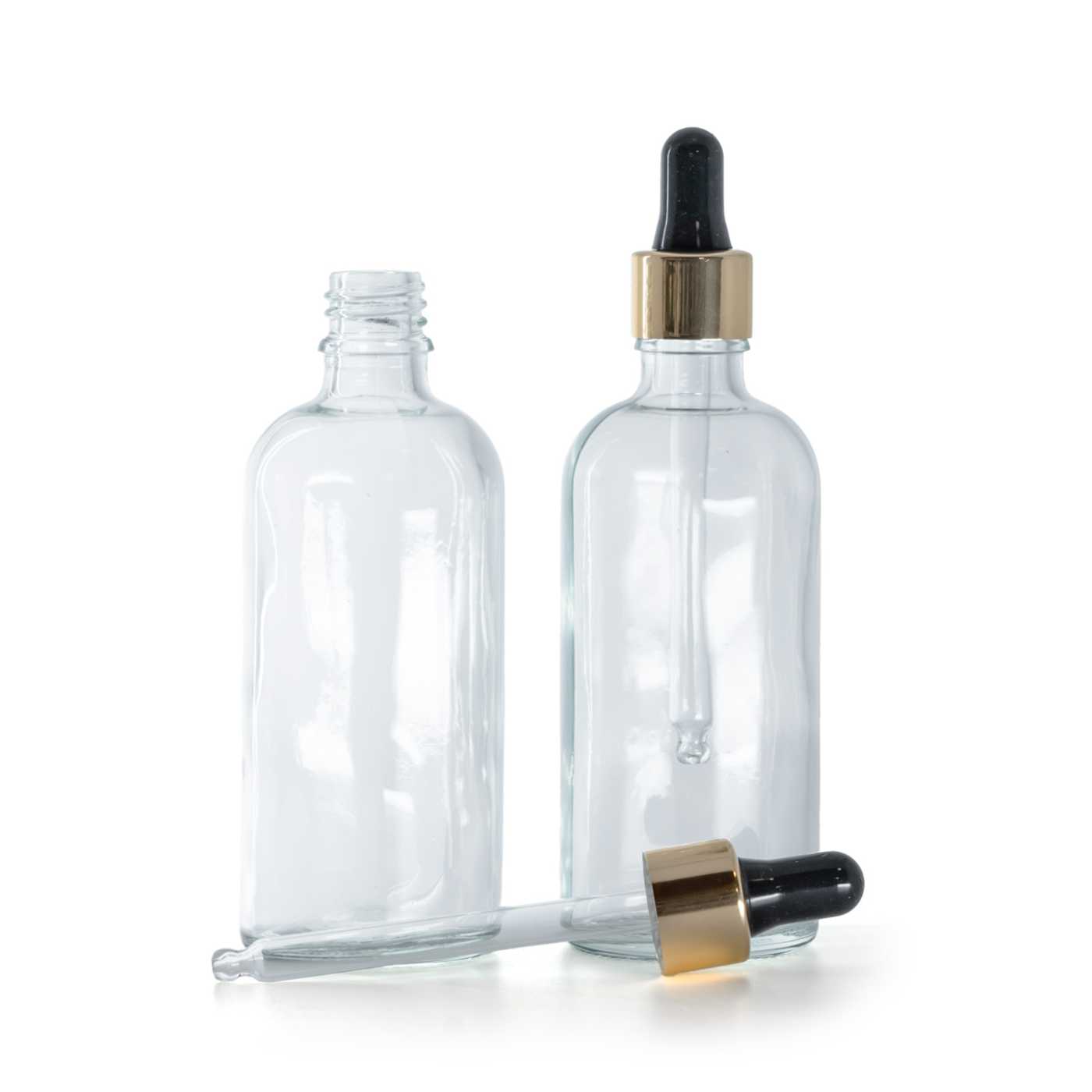 Botella de vidrio, transparente, gotero negro y dorado, 100 ml