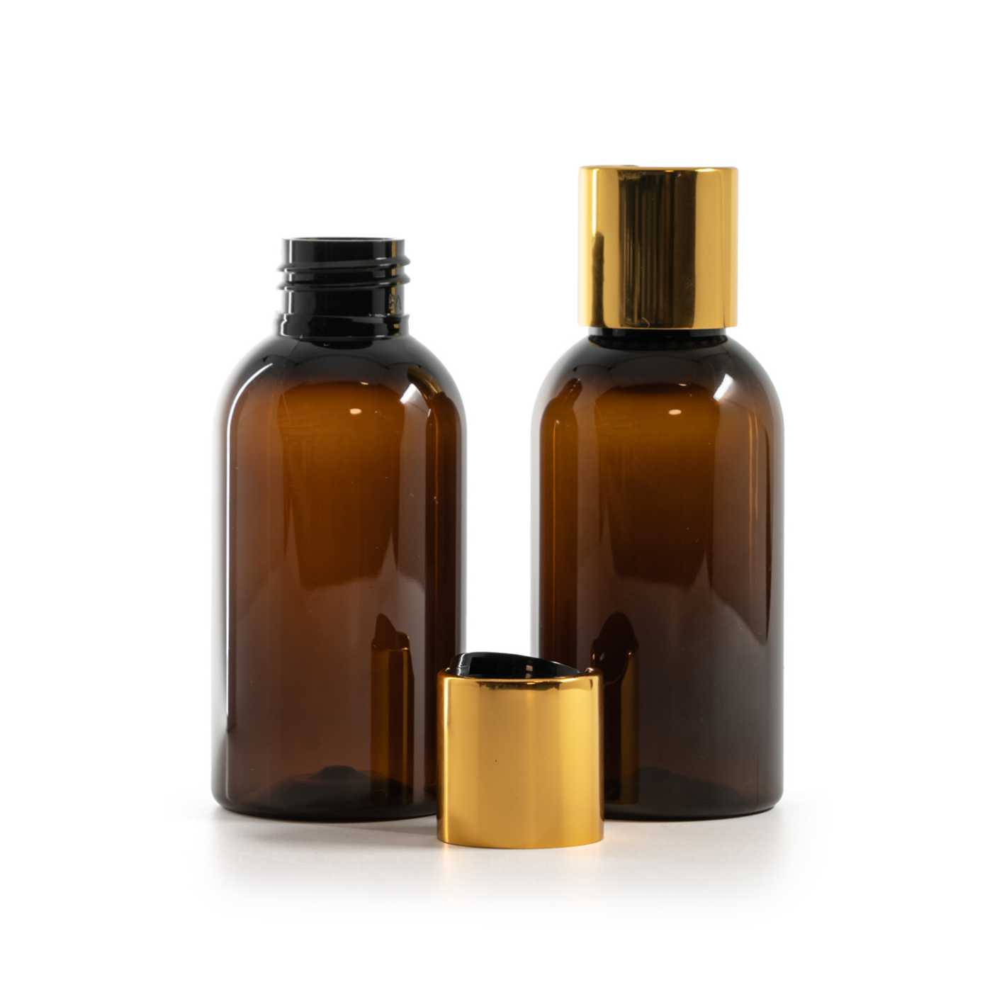 Plastová fľaša, hnedá, disc top vrchnák, zlatý, čierny stred, 100 ml