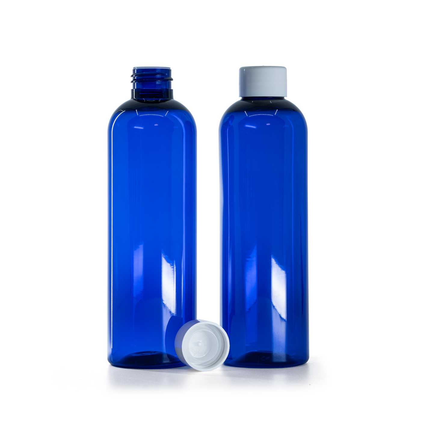 Bouteille en plastique bleue, bouchon blanc lisse avec réducteur, 250 ml