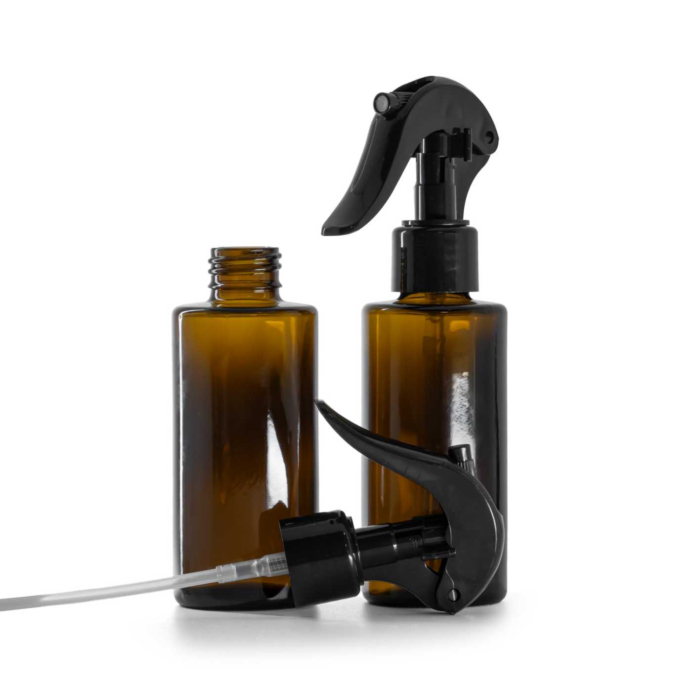 Botella de vidrio, ámbar, cuello recto, 24 mm, pulverizador de gatillo negro, 100 ml